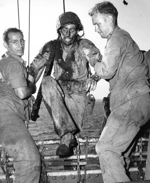 dogatemytank: 1944US Coast Guardsmen with a Marine, Eniwetok Island, Marshall Islands