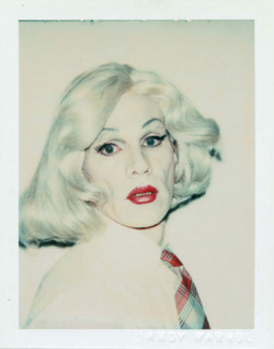 The High Priestess of Pop:  Warhol, Andy. Self-Portrait in Drag. 1981. Polaroid Polacolor 2. 