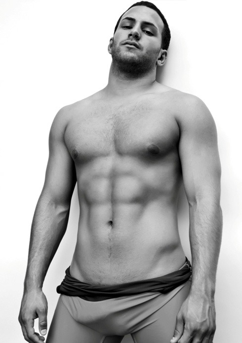 Beneath a singlet….