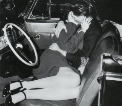  A couple making out at the Drive-In movie