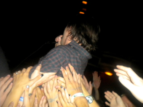 traviravioli:  Just a few of the halfway decent shots I got from the show the other night.The last one is my favorite.One second Conor is on stage, then the next he’s being held up by everyone standing right next to me.Good night. Fantastic night, to