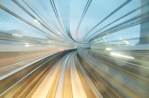 Long exposure shots from the New Transit Yurikamome, an automated guideway train that connects Odaiba to the mainland, passing through the Rainbow Bridge.