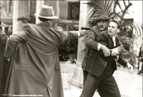 Kevin Costner as Elliot Ness facing down Al Capone (Robert De Niro) in Brian De Palma’s The Untouchables. Also features Sean Connery.