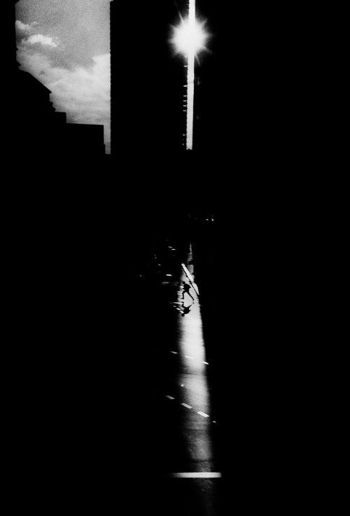 Australia. Sydney. A man dashes across traffic on Eddy Avenue photo by Trent Parke, Dream /Life series, 1997