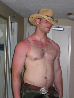 boywife19yo:  Singlet tan, furry tummy, cheeky grin - hello cowboy!