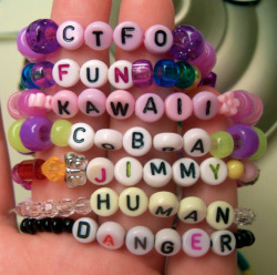 professor-meowingtons:  various bracelets i have that use circular letter beads 