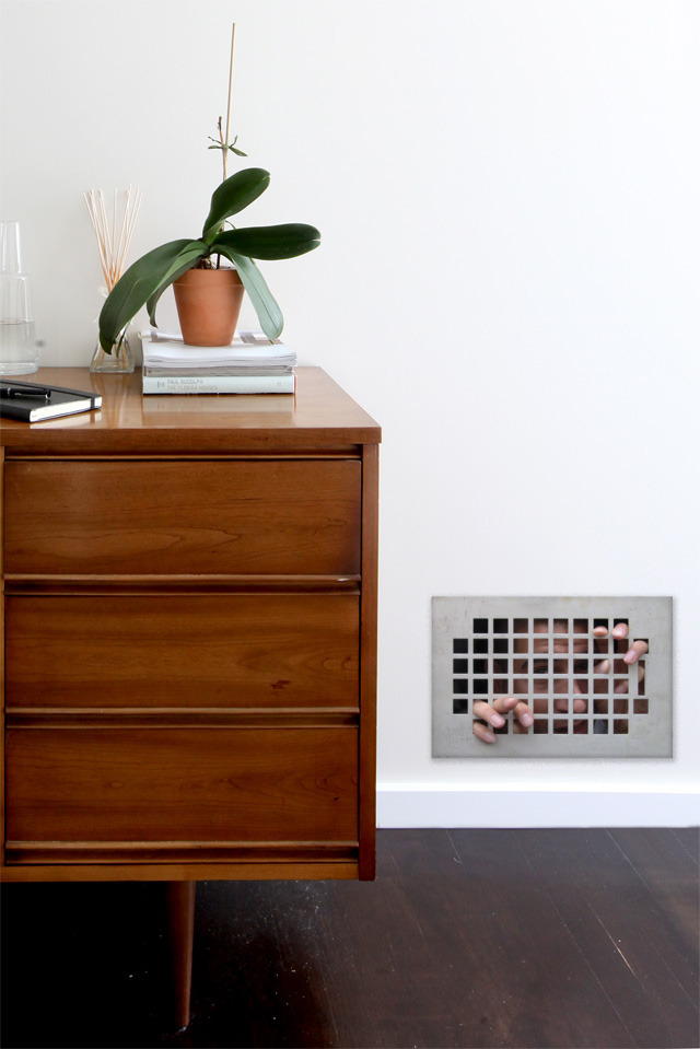 Shocking Illusion Wall Art by Dan Witz - There is a man trapped in my vent. You can buy these for $30.