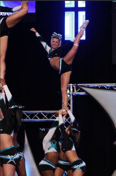 cheerhealthstyle:  hold on just a second, is she insanely short or is that just my
