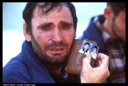 historycupboard:  Mustafa Xaja, Kosovar-Albanian refugee, Kosovar-Albanian border, Kukes, Albania, 1999  :’( 