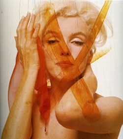 jacobpatterson:  1000scientists:  During her final photoshoot before her death, Bert Stern created some stunning photographs of Marilyn Monroe. However, the photos that Marilyn didn’t like, she smeared her red lipstick over the negative images to deter