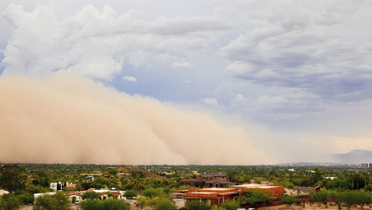 Billowing dust storm engulfs Phoenix
The wall of dust engulfed downtown Phoenix on Thursday, cutting visibility to a few hundred yards and delaying flights at the international airport.