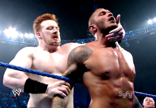 pervyrasslincaps:  Just when Orton thought that one rape threat had been overcome, in comes another one from over the horizon. In the form of an African-American weightlifter.  Uh….O.O Both Sheamus and Randy look like they are enjoying themselves!