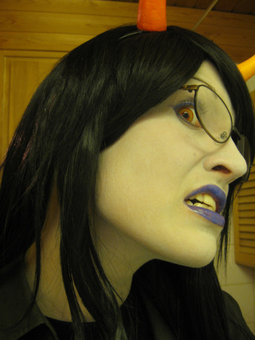 guieuidsjhyg:  sadynax:  anniilaugh:  Vriska cosplay update. :)  I got my contacts today, yay! it’s gonna take a looooot of time to get used to those hahaha. And some makeup test. My tweaked roboarm is still WIP and looks too dim in that photo. Anyhow,