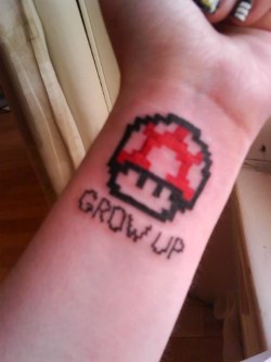 fuckyeahtattoos:  Got this tattoo on the 24th August 2011. It’s my first ever tattoo so I wanted to make it a good one.The story behind this tattoo is very simple: I love Super Mario. Not only Super Mario, but all video games. I’ve been playing Super