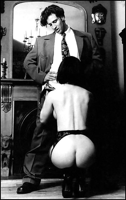 Crouched before him, she unzipped his pants and took his cock into her hands.  She waited until