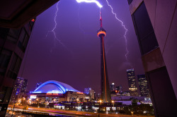  cmagalyh:  CN Tower decorated for the passing of Jack Layton, struck by lightning.  