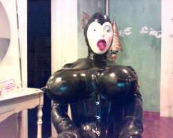 a near perfect rubber dolly need bigger blow up tits to be extra perfect my fantasy,mmmmm.