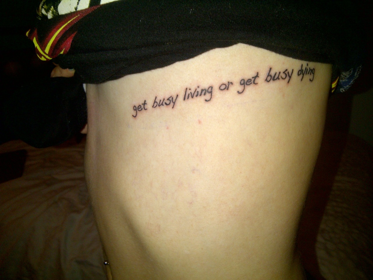 Get busy livin or get busy dying tattoo