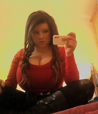 rubberpirate:  worldofboobs:  ” Just how the hell do I get these huge  tits into this silly little photo ? “   boah, she must be my gf….