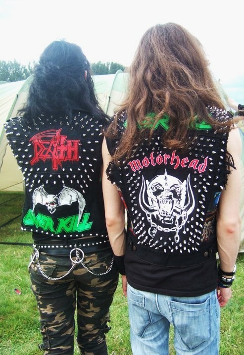 thrashersteve:  mambonumber666:  My boyfriend and I in our battle armour at this year’s Bloodstock Festival. Death, Chaly/Overkill and Motörhead backprints hand painted by me. :)  Fucking cute \m/ 