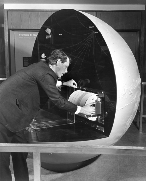 mpdrolet:  Dr. Manson adjusting instruments on Seismographic Globes, Hall of Earth History, 1969 Alex J. Rota AMNH Collection