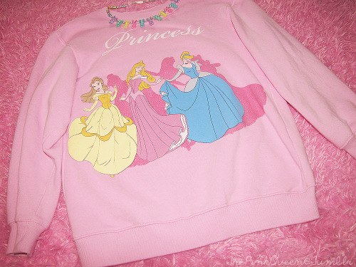 candiedmoon:  Glittery pink Disney Princess sweater and pastel iridescent bunny bead necklace. ♥ 