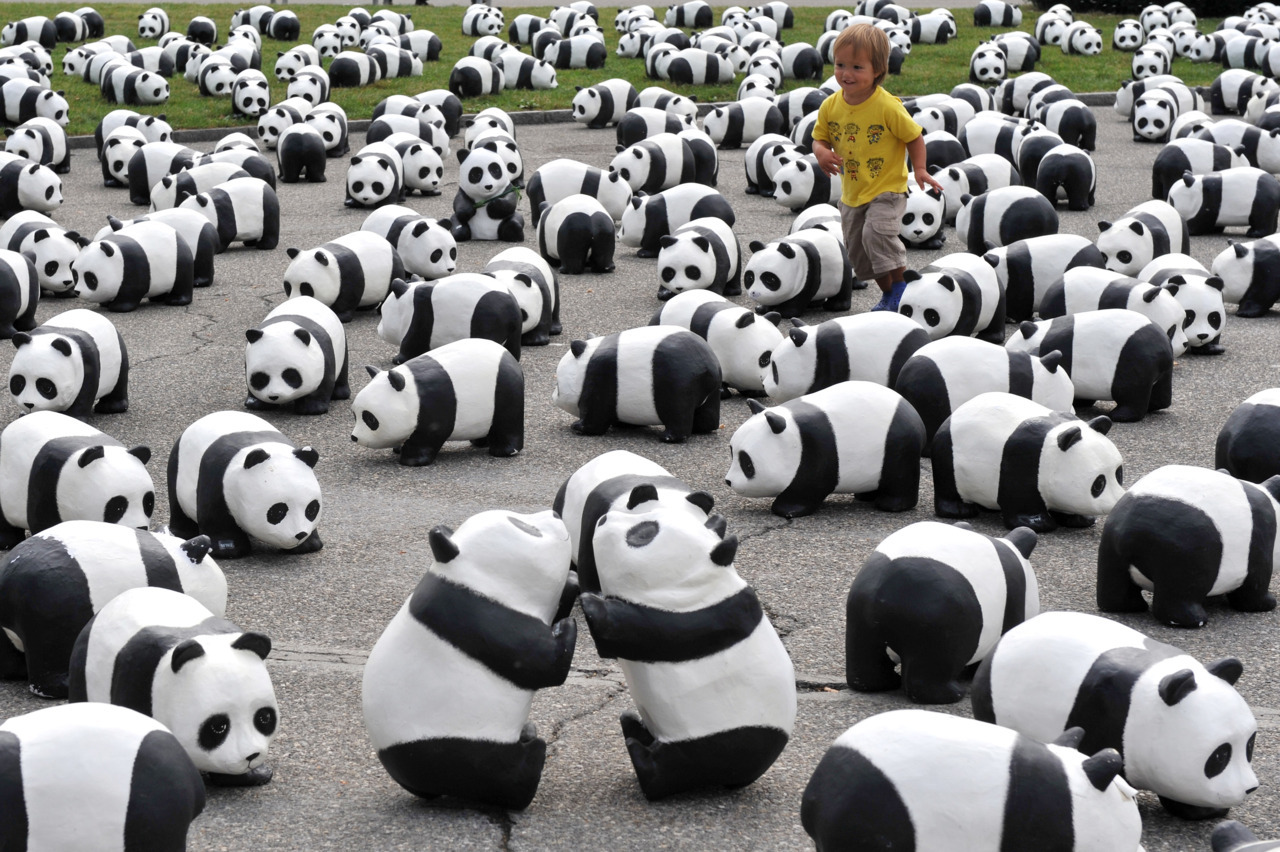 nationalpost:  Photos of the day A child runs amongst some of the 1,600 papier mache