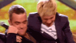 wearethedirectioners:   nialls-irishness:  styleslikeharry:  “hahaha this is so fun- ….. er, wait wut?” Omg, Nialler. Y u so adorable? I could stare at this give all day long  hes like oh this is fun and then omg I’m being lifted by Robbie Williams.