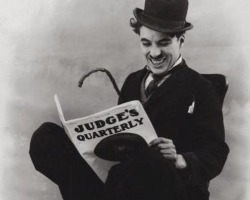 awesomepeoplereading:  Charlie Chaplin reads.
