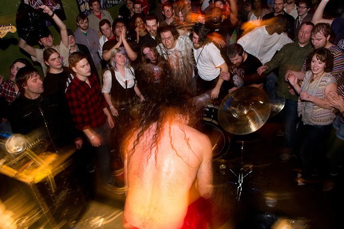 Monotonix at Bottletree.
Found this photo while creeping on Facebook. I’m at your 11 o'clock, hiding behind a couple other people. Not sure what garbage guy was doing.