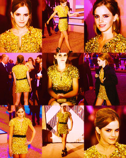 maygunrose:  TOP FIFTEEN EMMA WATSON OUTFITS | ONE  London Fashion Week / Burberry - Wearing a custom made gold sequined Burberry Dress and black strap-over Burberry Heels.  