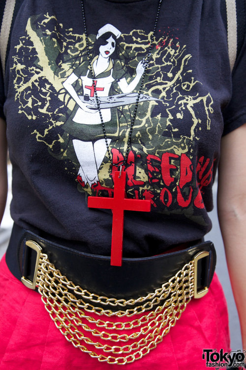 Wooden red cross necklace in Harajuku - a very popular accessory this year.