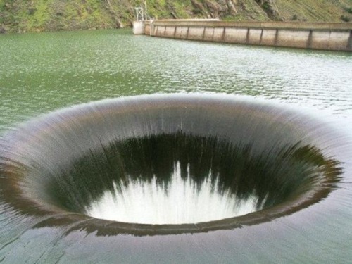 jennaanne01:The “Glory Hole” in Napa Valley, swallows water at a rate of 48,800 cubic feet per secon