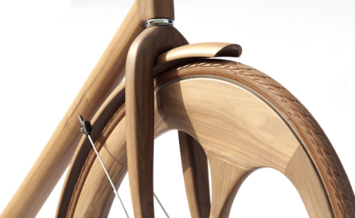 devincastro:  Designer Jan Gunneweg created this gorgeous wooden bicycle which not only has a solid wood frame, but asymmetrical wooden wheels and natural-tone brown tires. 