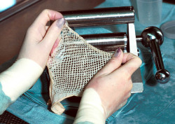  Processing Cadaver SkinAt the University of Texas at Galveston’s Bone and Tissue Bank, skin from a donor is rolled through a mesh making machine - which helps the skin cover a larger wound area.   