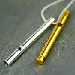 wickedclothes:  A working whistle necklace.