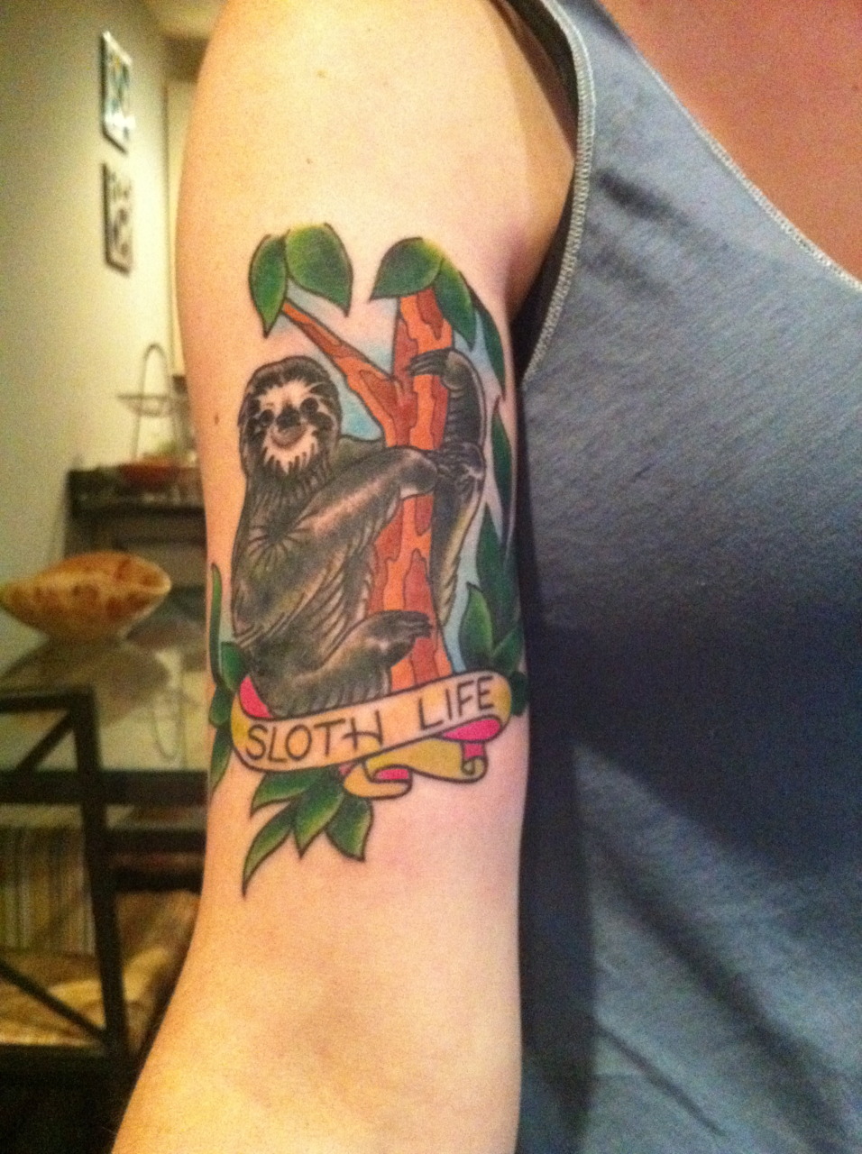 fuckyeahtattoos:  You know, just living the sloth life.  