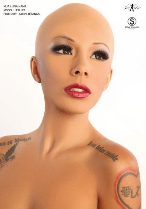 kelvinween:  Niggas, its real. :X  Jeri Lee. ‘Bald is Beautiful’  she looks plastic..