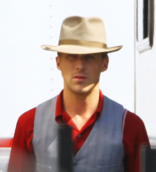 pocketsfullofpearls:  hollywoodbulletin:  Ryan Gosling kills us all with his devilishly good looks on the set of his next film, The Gangster Squad, on Tuesday, September 13. Ryan just got back from the Toronto International Film Festival and went straight