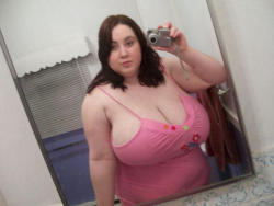 she may be chubby but them tits are big and look like they need attention,mmmmm,xxxxxx.