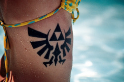ragingbeard:  I really like this tattoo, what is it exactly? What’s this symbol from??  Hyrule seal from the Legend of Zelda series