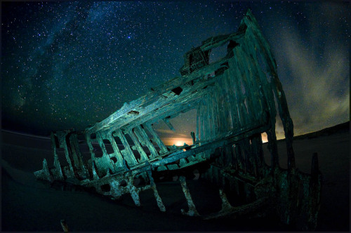 Astoria Night Shoot • Peter Iredale drifting below the stars (via victorvonsalza)