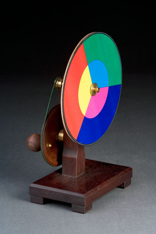 Newton&rsquo;s disc is a cardboard disc with different sectors colored red, orange,