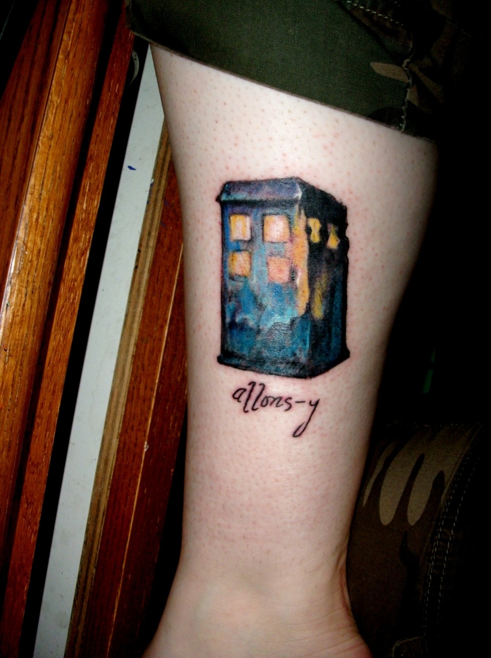 Got this today at Eternal Image in Tiffin, OH by Jim Cook. It’s on my inside right leg; spent about forty-five minutes in the chair, cost of $100 [SO much less than what I was expecting, with all the color it uses].
It’s the TARDIS from Doctor Who,...