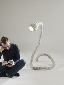 therhumboogie:  By Pudelskern Design, this is one of my favourite all time lighting designs, it has that really unusual creature-like appearance, plus it’s knitted which is cool.   Is it an eye, or is it a lamp? Smoothly it turns its head and searches