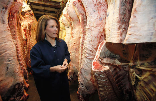 And now, here’s Michele Bachmann hanging out with a bunch of cow carcasses
Michele Bachmann tours a meat processing plant in Des Moines, Iowa, but just seems happy to find mindless meat slabs that won’t fact check her.
Via