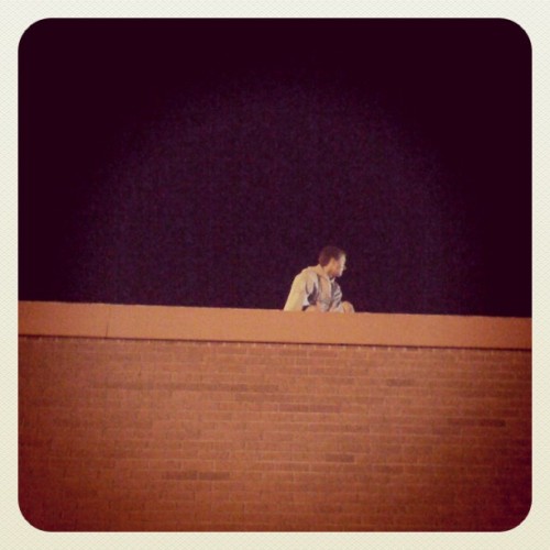 Friday night football games, bubba kicked my hacky sack on top of the school.. (Taken with instagram)