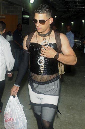 Red Sox infielder Jose Iglesias in a dominatrix costume. Gotta love rookie hazing.
(AP photo)