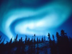 sav3mys0ul:  (via Swirling Aurora)  Photograph by Paul Nicklen The sky over Yellowknife, Northwest Territories, Canada, churns with light from an aurora borealis. 