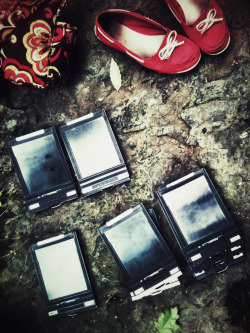 by Scott Nichol His 4x5 film holders and my shoes and purse.  p.s. this wasn&rsquo;t staged, but it sure looks like it! p.s.s. this was taken 3 hours before I went into the ER for a serious kidney infection.  p.s.s.s. I&rsquo;m badass.